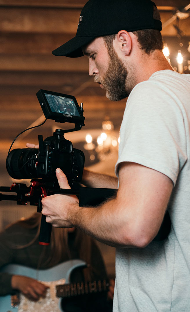 Man Holding Camera info-9